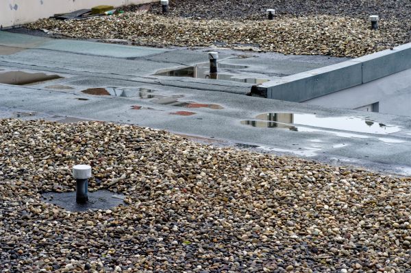 Tar And Gravel Roof Repair in Manchester