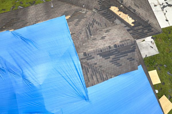 Storm Damage Roof Tarping in Manchester